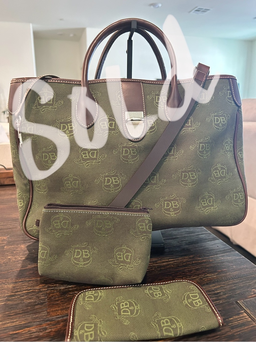 Dooney & Bourke signature satchel witOlive Green Monogram and Brown Trim.